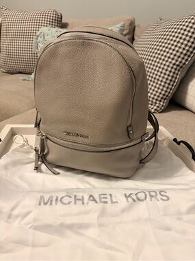 Michael Kors Pebbled Leather Rhea Backpack in Cement Gray